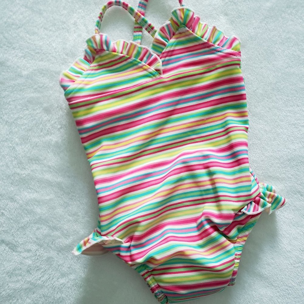 I play. Baby Swimsuit with reusable swim diaper.